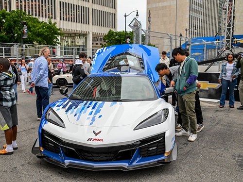 Fans look at a Corvette at Cruise Night