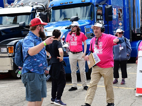 A volunteer gives directions