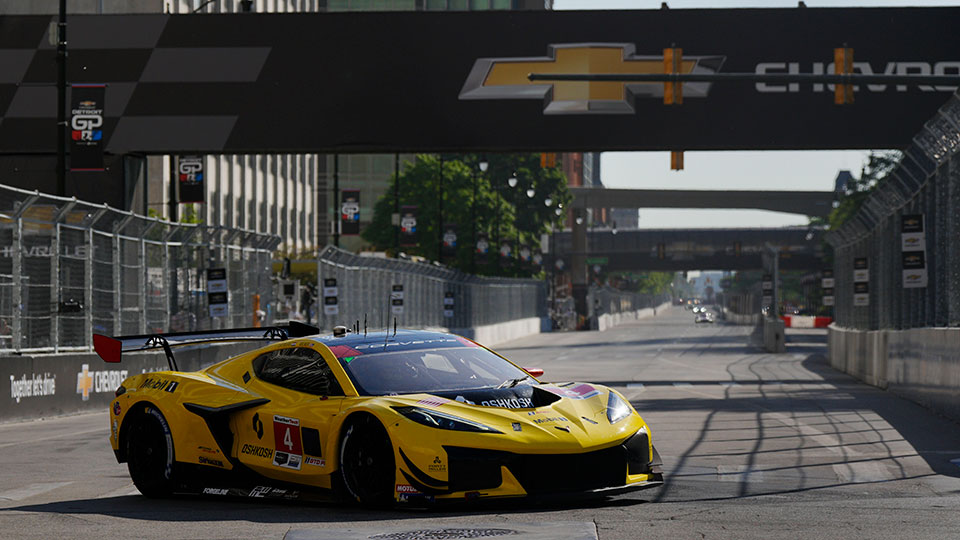 A corvette drives on the track