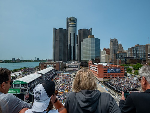 Fans watch the detroit grand prix from the rooftops