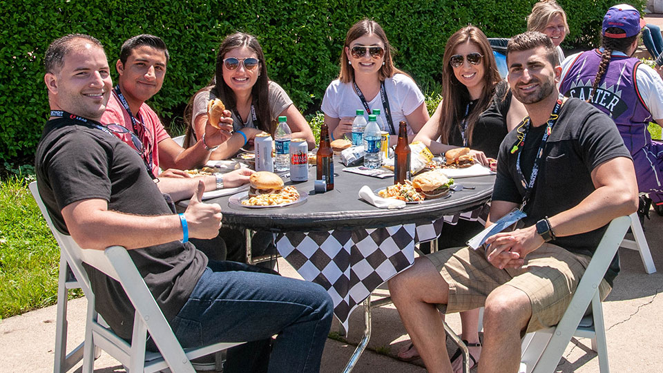 A group enjoys the plaza club