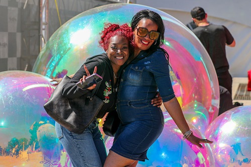 Women in front of a bubble at Chevrolet Detroit Grand Prix Presented by Lear